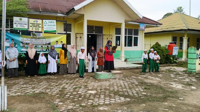 Amanat Pembina Upacara Ibu Dra. Murni Mari  Meriahkan MTQ ke-54 di Kabupaten Muaro Jambi Dan Disiplin Siswa Siswi